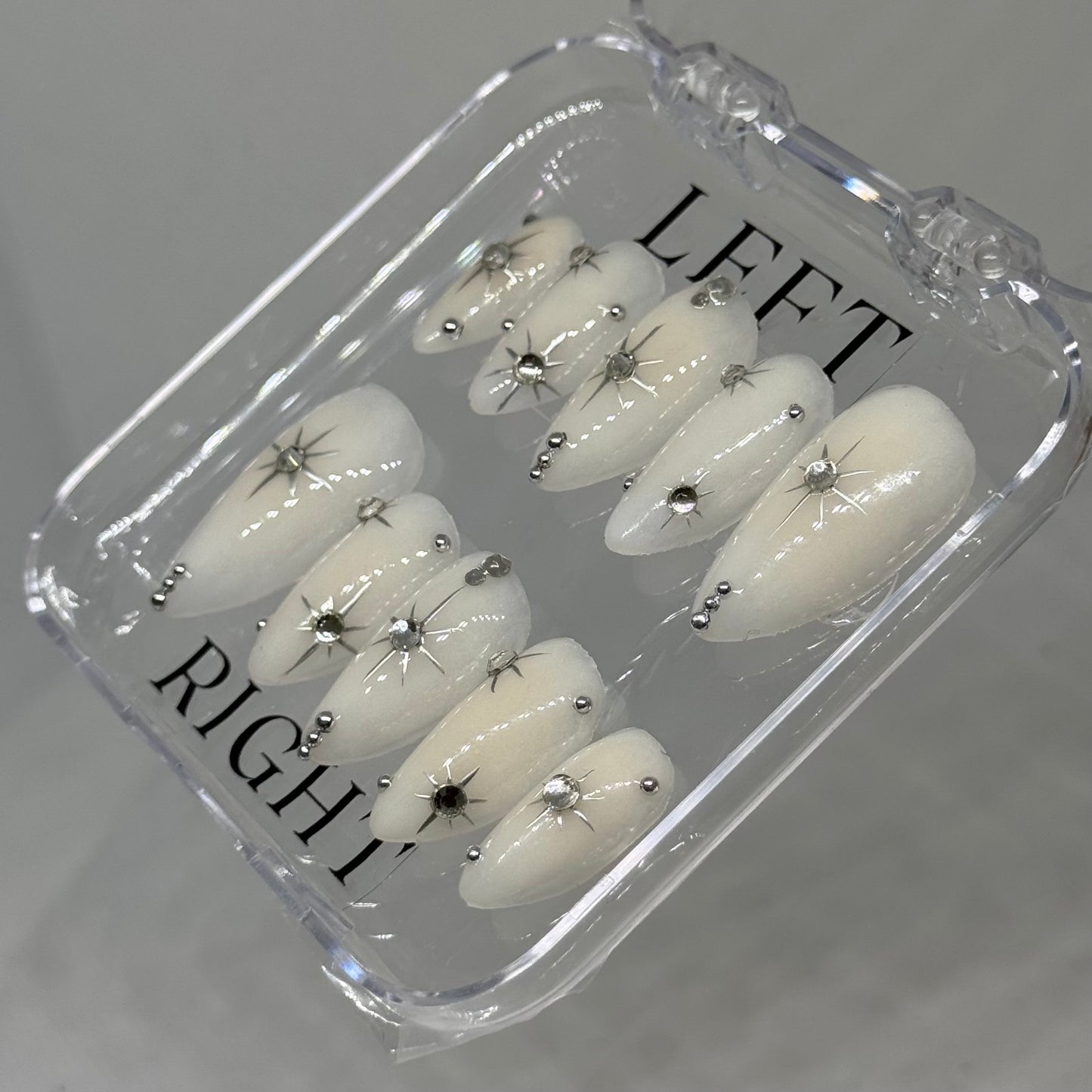 Off white set with silver stars and stones
