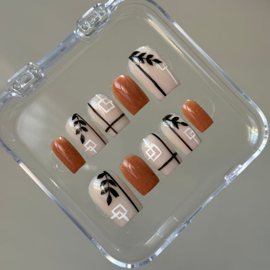 Brown with black flowers