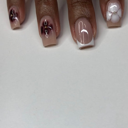 Nude nails with blooming gel flowers